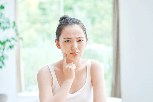 What are the common causes of dull skin